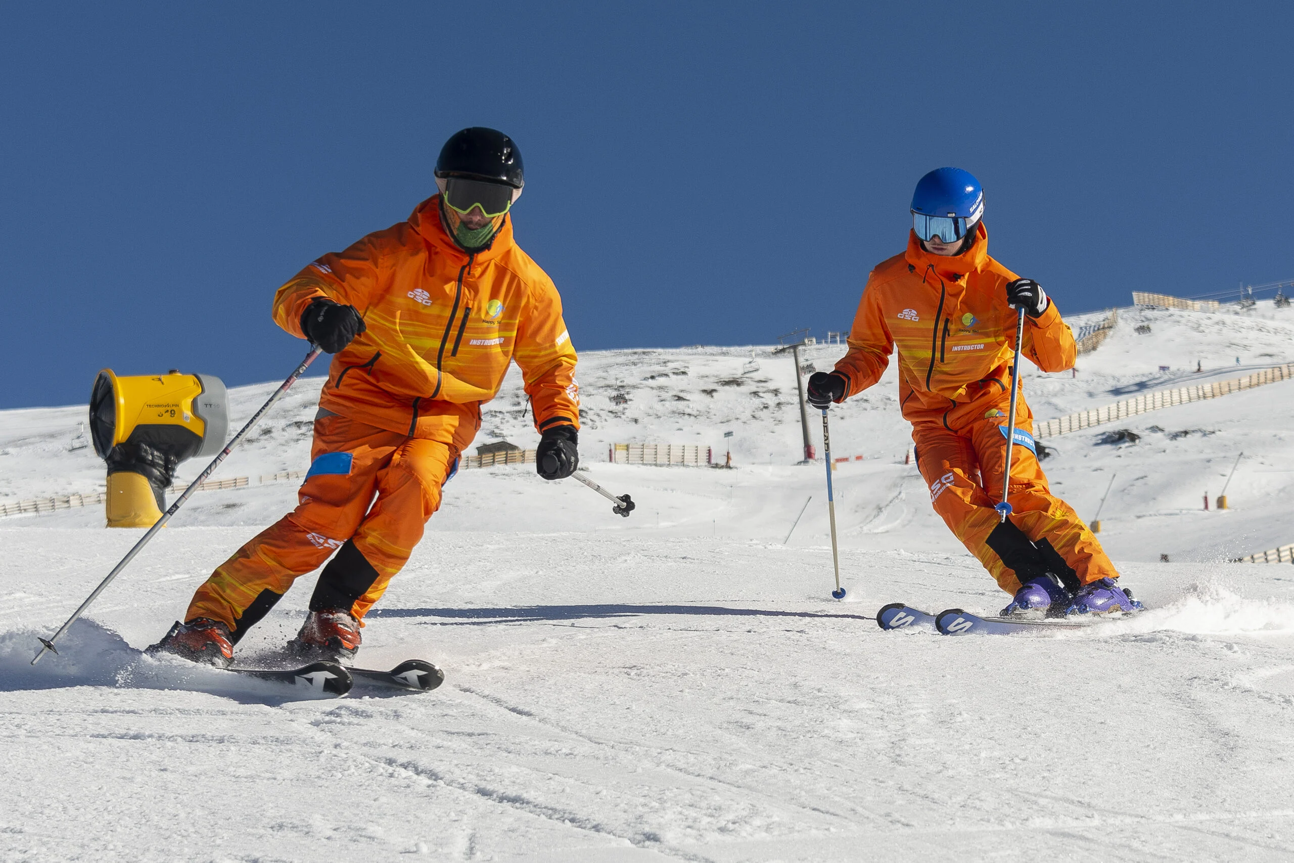 Adults improving their skiing technique in Sierra Nevada