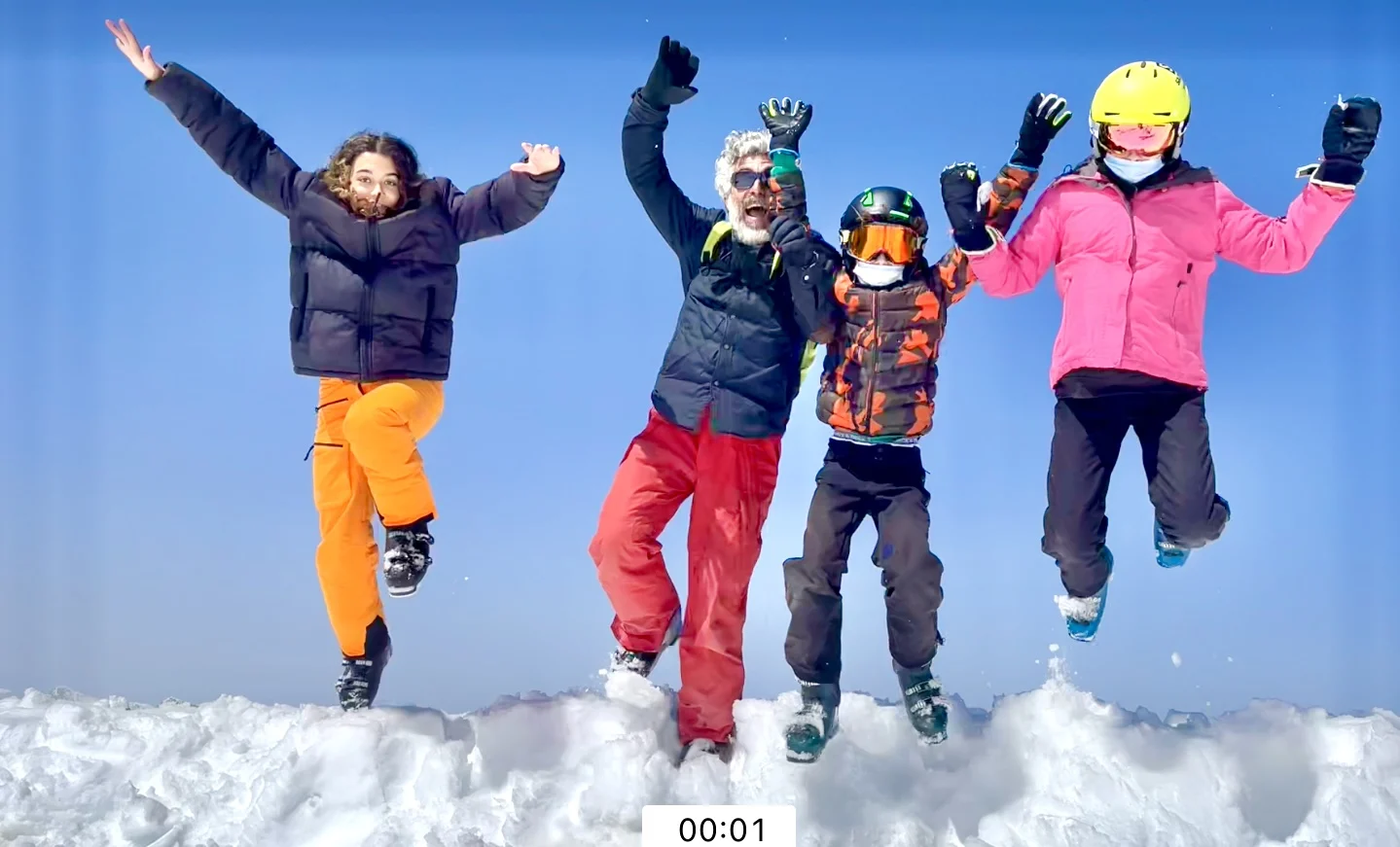 Family jumping in the snow